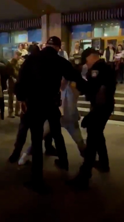 Ukrainian Military Officials Allegedly Dragged Cyclist into Bus Amid Mobilization Tensions